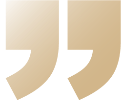 Stylized golden quotation marks design.