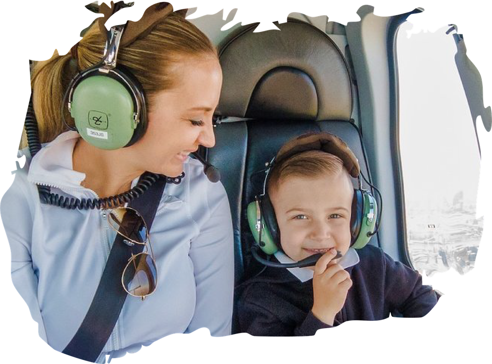 Mother and child wearing headphones together.