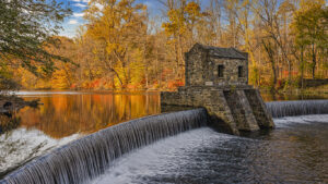 Autumn scene of the historic dam at Speedwell Lake in Morristown