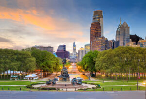 Philadelphia skyline at sunset with park